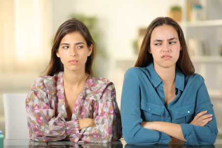 siblings fighting in an office